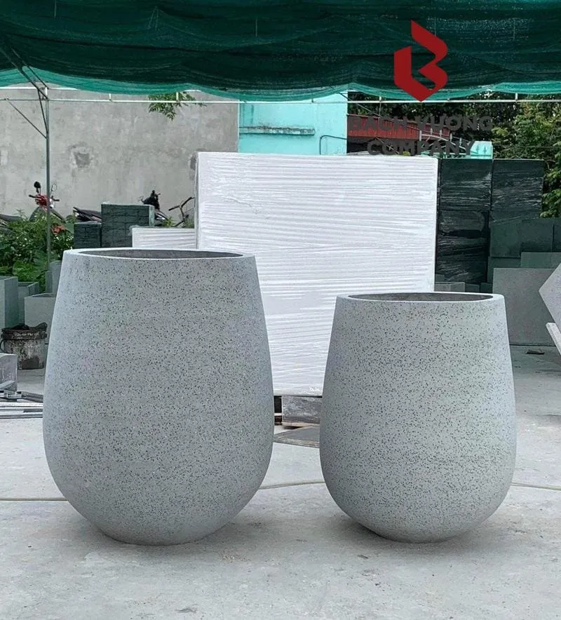 xi-mang-da-mai-3 Chậu xi măng với độ bền cao và tính thẩm mỹ hiện đại phù hợp cho vườn phố